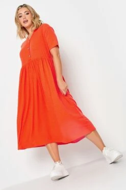LIMITED COLLECTION - Robe Midi Orange Nervuré Peplum